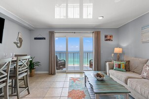 Condo, 1 King Bed with Sofa bed (The Summit 1409) | Living area | Flat-screen TV