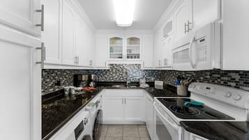 Condo, Multiple Beds (The Summit 1130) | Private kitchen