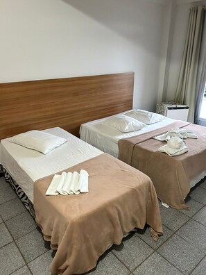 Deluxe Triple Room, 5 Bedrooms | Iron/ironing board, free WiFi, bed sheets - Piúma Palace Hotel, Lourdes (Piuma)