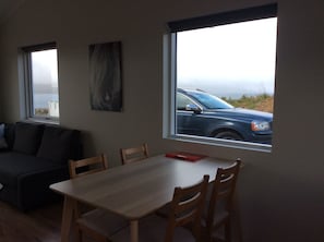 House, 1 Bedroom | Living area | 33-inch flat-screen TV with premium channels, TV, heated floors