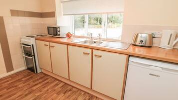 Casa de campo | Cocina privada | Periquera y utensilios de cocina