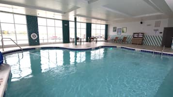 Indoor pool, open 8:00 AM to 11:00 PM, pool loungers