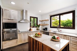 Fridge, microwave, oven, stovetop - Family Paradise Villa w/ Hot Tub, Private Pool, Playground & Beach Club – 0.5 Miles from the Beach (Hacienda Pinilla)