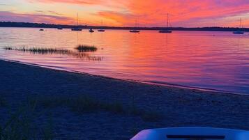 On the beach, sun-loungers, beach towels