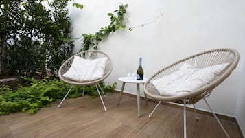 Habitación cuádruple superior, patio | Terraza o patio