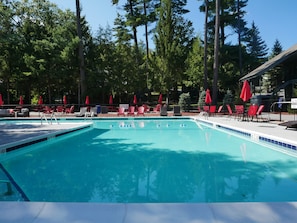 Seasonal outdoor pool, open 9:00 AM to 7:00 PM, pool umbrellas