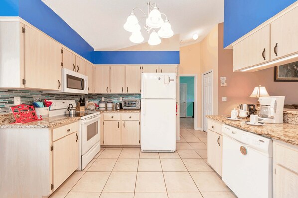 Villa | Private kitchen | Fridge, microwave, oven, stovetop