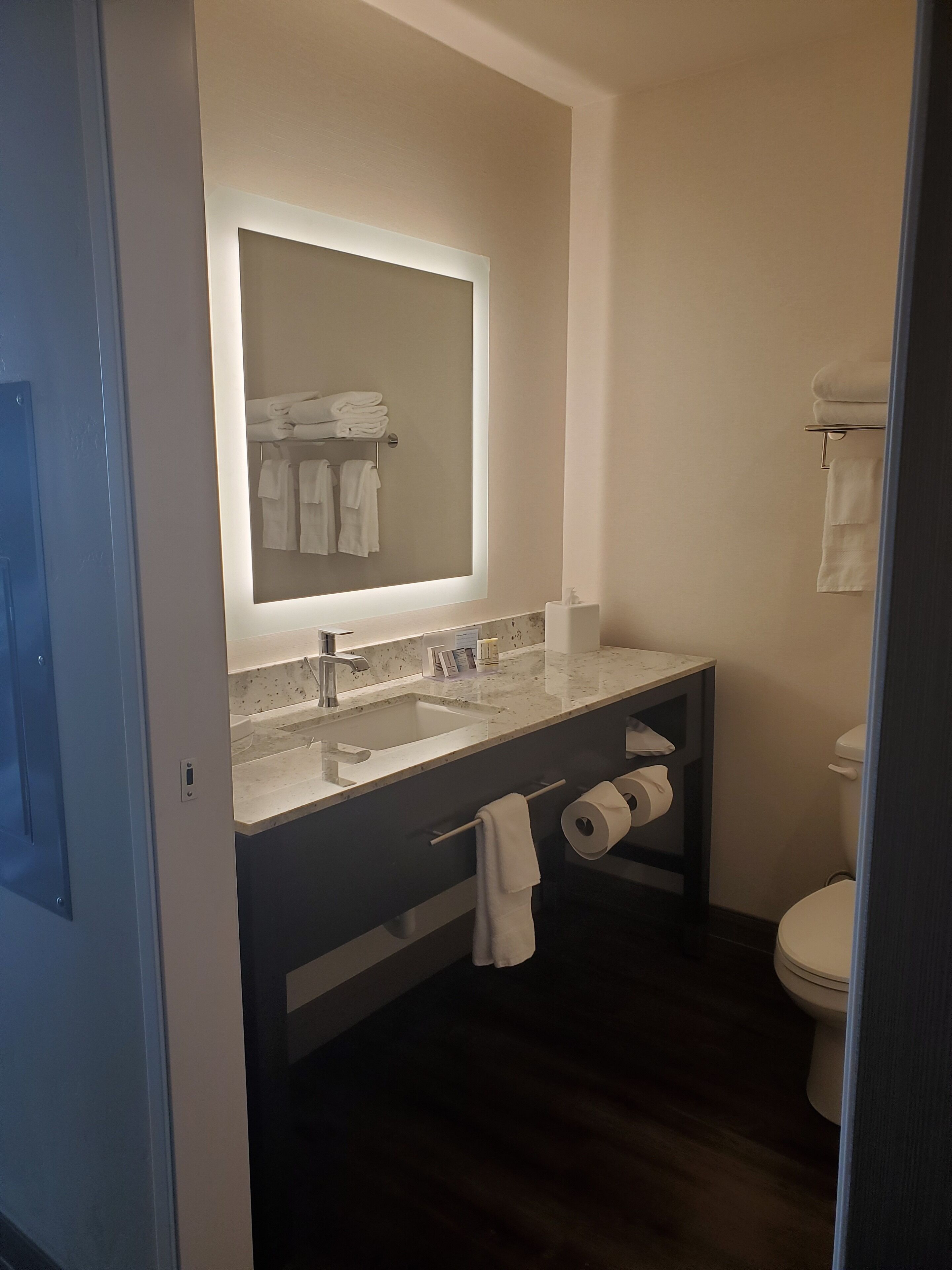 desk, laptop workspace, blackout curtains, iron/ironing board