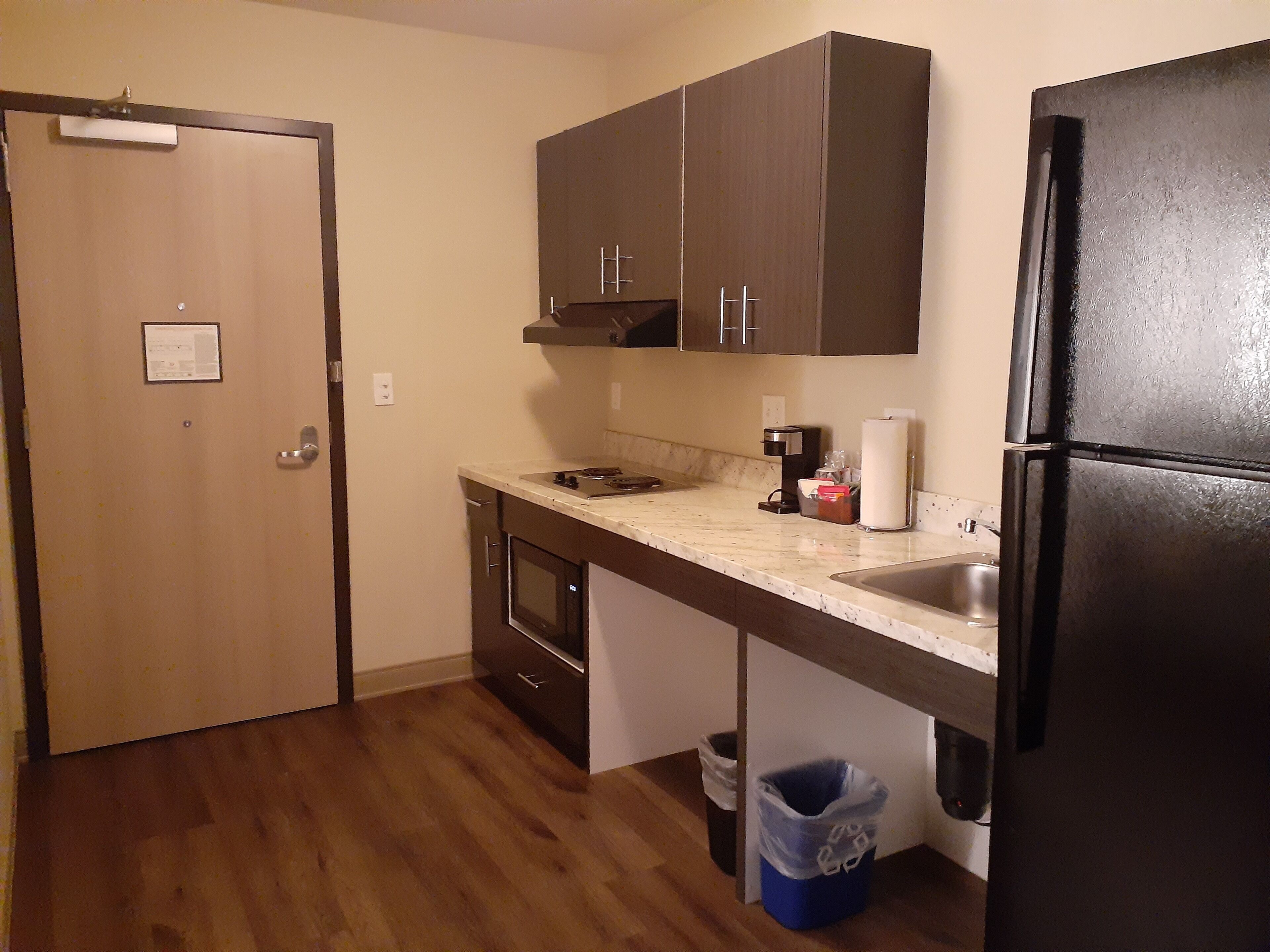 design single room | private kitchenette | full-sized fridge, microwave, stovetop, coffee/tea maker