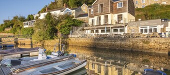 Dette feriehus ligger lige ved vandkanten inden for Malpas Marina