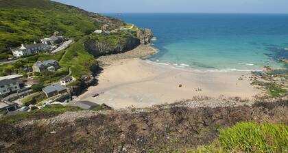 A fabulous beach house with sea views and a lovely, enclosed garden.