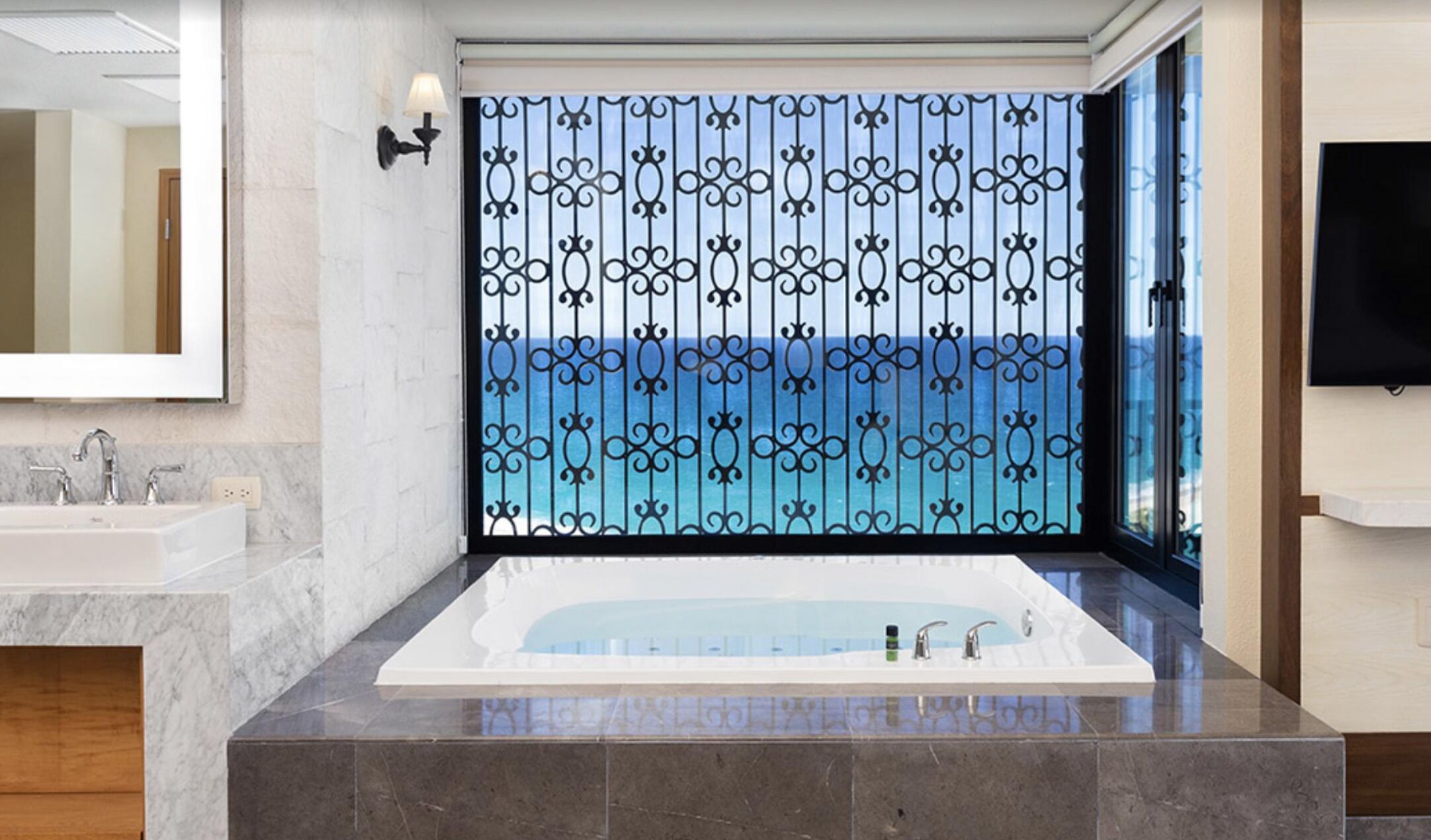 jetted bath, hair dryer, towels, soap