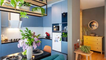 Fridge, microwave, coffee/tea maker, dining tables