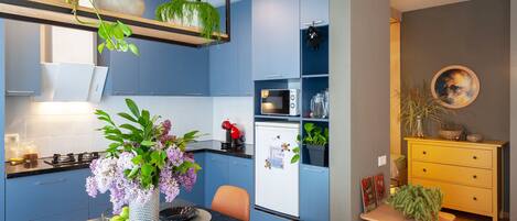 Fridge, microwave, coffee/tea maker, dining tables