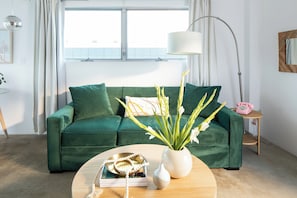 Studio, Mobility Accessible (Deluxe Studio) | Living area | 50-inch flat-screen TV with cable channels, TV, Netflix