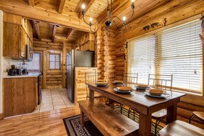 Dining - 1 mile from Pigeon Forge log cabin Townhouse has hot tub with indoor and outdoor pool sleep 8 (Pigeon Forge)
