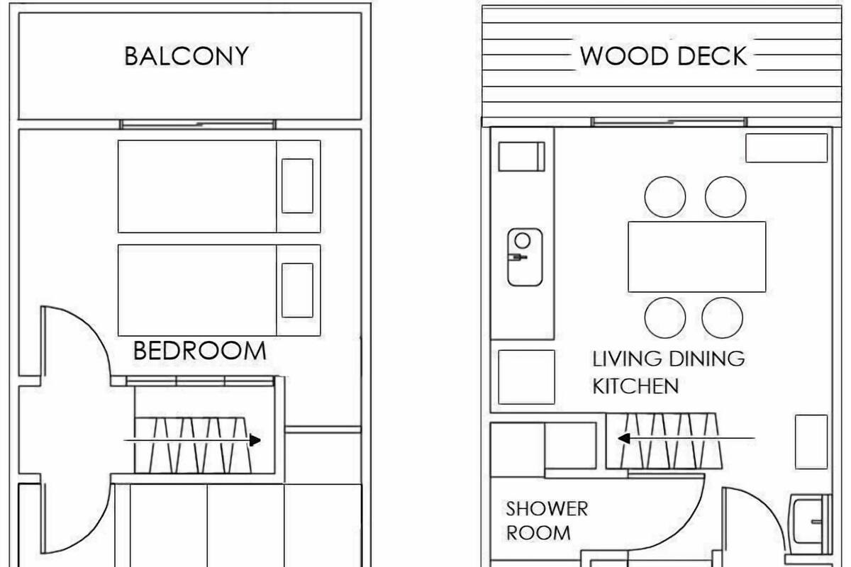 A floor plan with a balcony, bedroom, tatami room, living dining kitchen, shower room, and toilet.