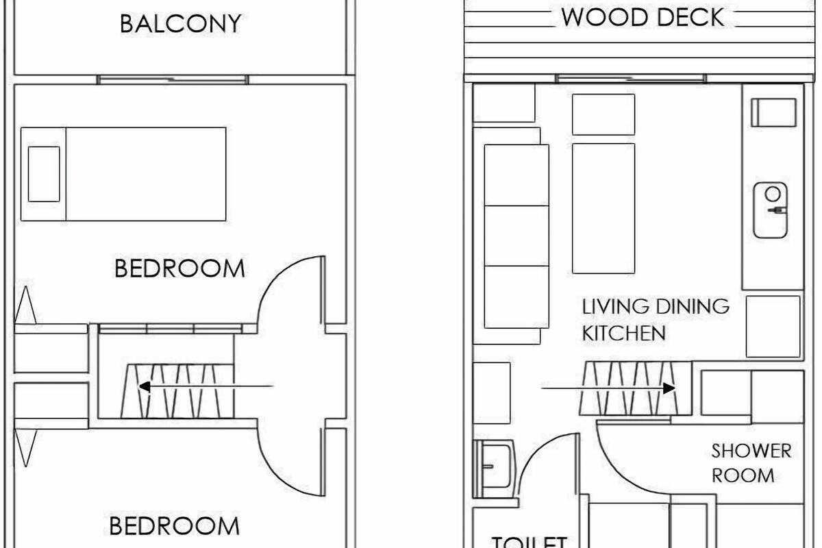 A floor plan with a balcony, two bedrooms, a living dining kitchen, a shower room, and an entrance.