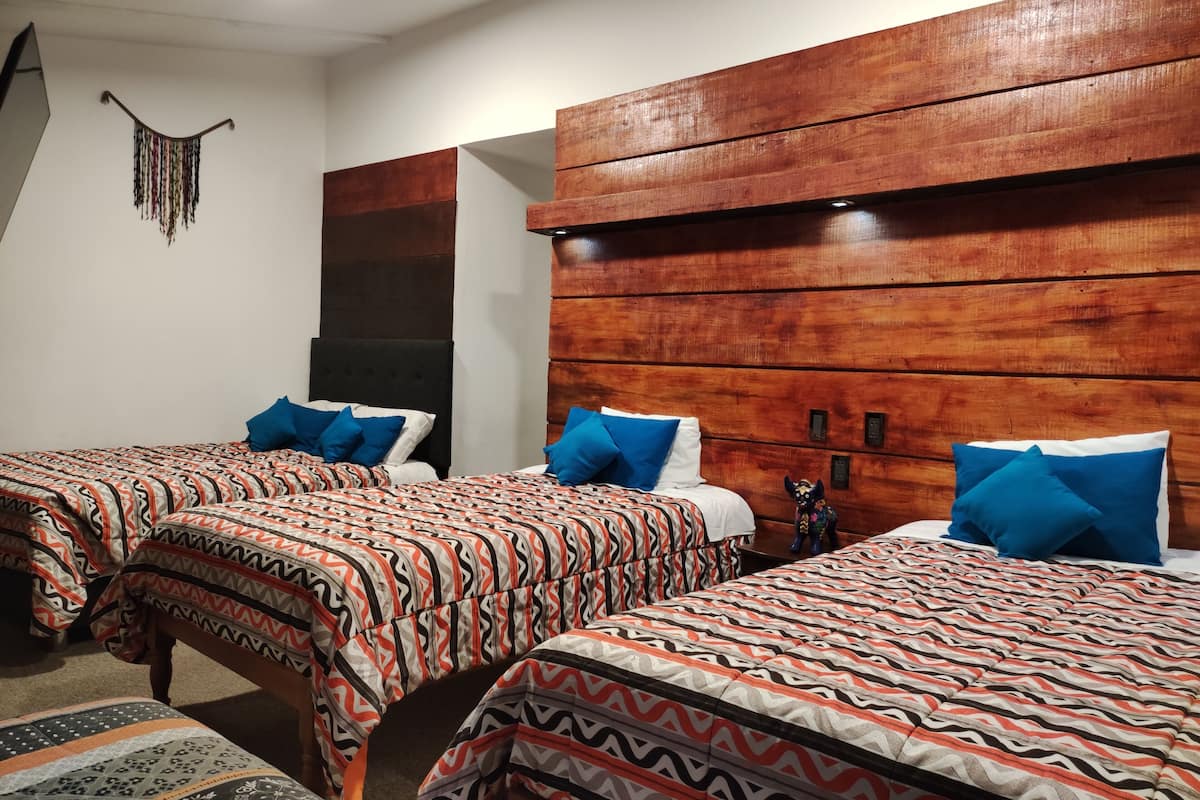 Luxury Quadruple Room | Down comforters, Tempur-Pedic beds, individually decorated