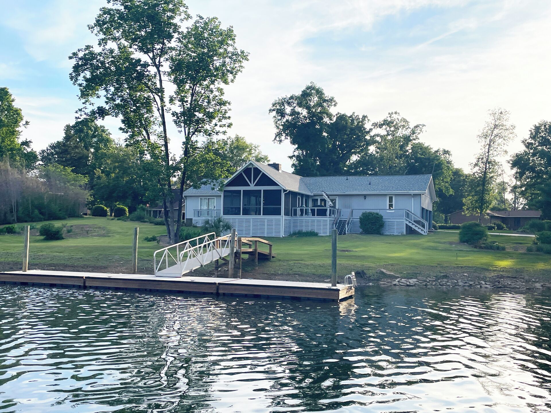 Back yard/screened porch from the water.