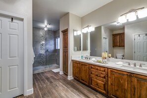 Combined shower/bathtub, hair dryer, towels, soap