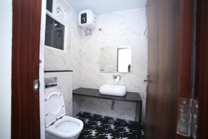 Shower, rainfall showerhead, towels