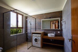 Shower, hair dryer, towels, soap