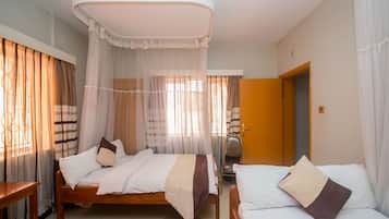 Quarto duplo executivo | 4 quartos, escrivaninha, Wi-Fi de cortesia