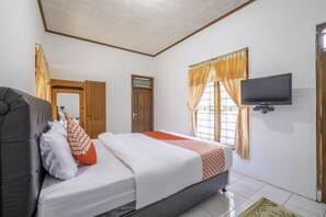 Habitación Deluxe doble | Escritorio, wifi gratis, ropa de cama