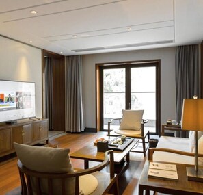 Suíte executiva | Sala de estar | TV LED 55 polegadas com canais digitais, TV