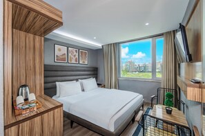 Egyptian cotton sheets, premium bedding, down comforters, minibar