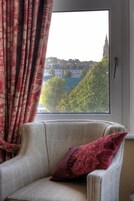 Family Room with Sea View (2 Adults + 2 children) | Living area | LCD TV