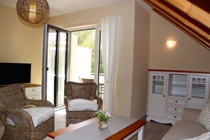 Apartment (Apartment 7) | Wohnbereich | Flachbildfernseher, Kamin, Fußbodenheizung