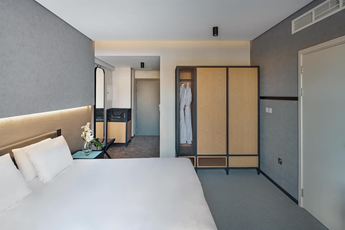 Chambre (Simplicity) | 1 chambre, minibar, coffre-fort pour ordinateur portable, bureau