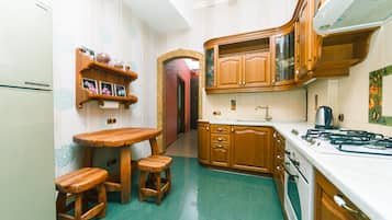 Apartment | Private kitchen | Full-size fridge, microwave, oven, stovetop