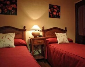 Desk, free cots/infant beds, rollaway beds, bed sheets