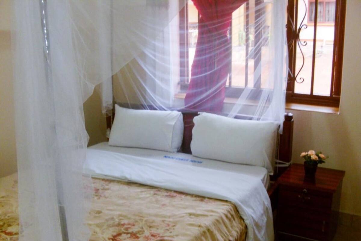 Chad | Iron/ironing board (on request), WiFi (free), bed sheets