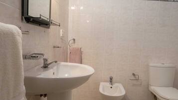 Shower, free toiletries, towels, soap