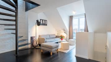 Panoramic Apartment, 1 Bedroom | Living area | Flat-screen TV