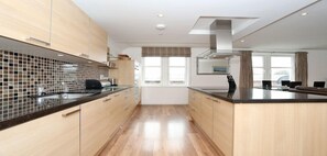 Fridge, microwave, oven, stovetop - Polmuir Gardens Apartment-Town & Country (Aberdeen)