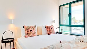 2 chambres, coffres-forts dans les chambres, fer et planche à repasser