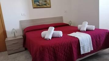 Double Room | Minibar, desk, iron/ironing board, cribs/infant beds