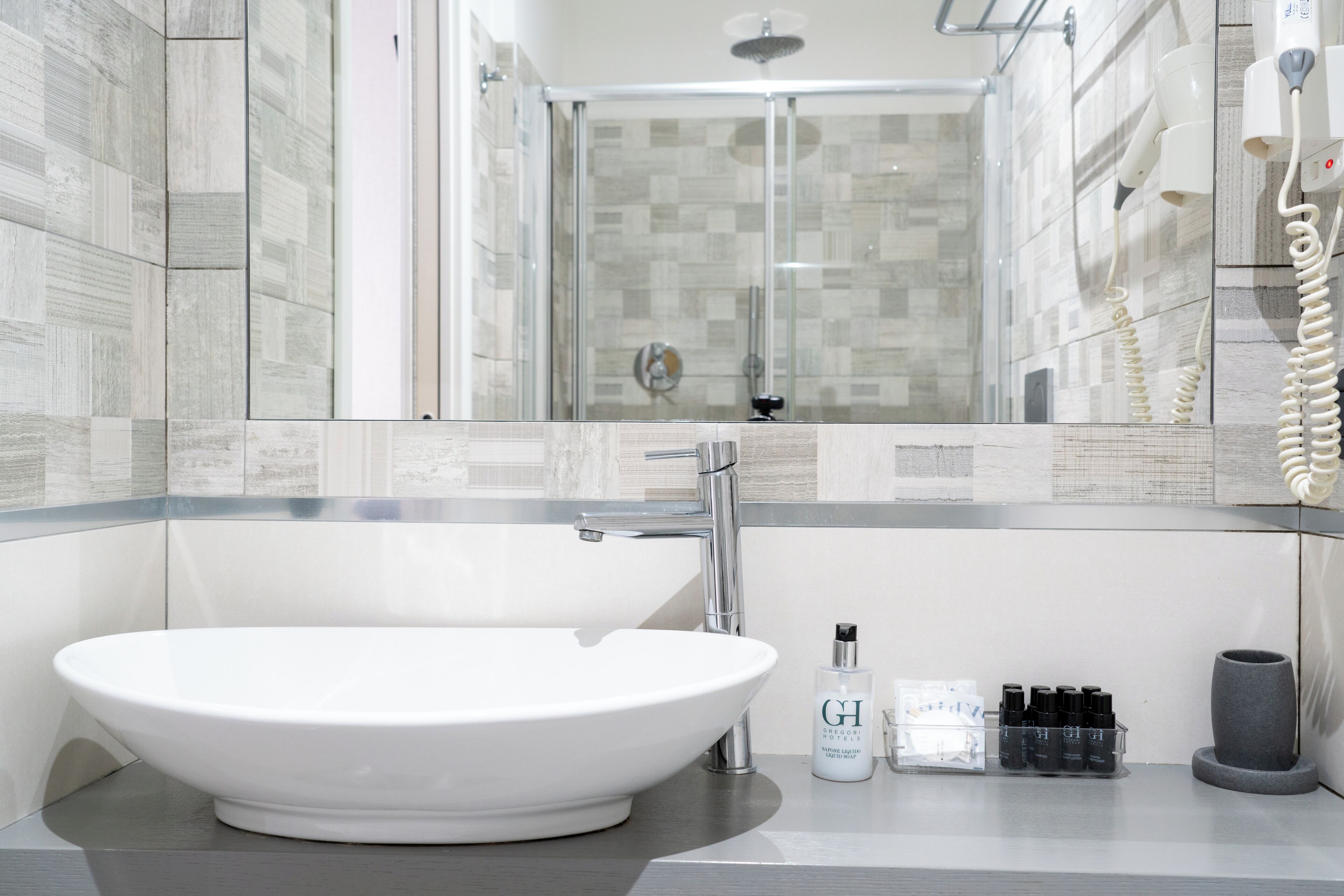 basic room | bathroom | shower, rainfall showerhead, free toiletries, hair dryer