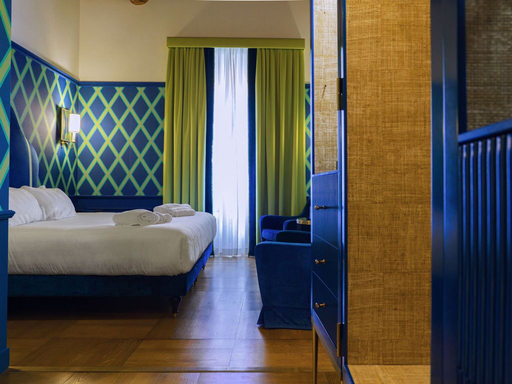 Premium bedding, down comforters, minibar, in-room safe