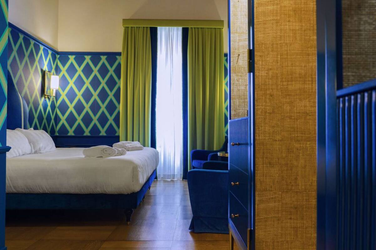 Premium bedding, down comforters, minibar, in-room safe