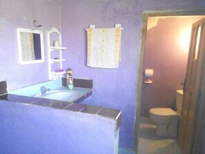 Shower, rainfall showerhead, towels, soap