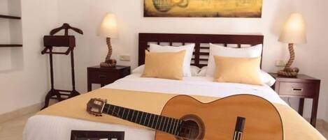 Suite junior, balcón | Sábanas de algodón egipcio, ropa de cama de alta calidad y edredón