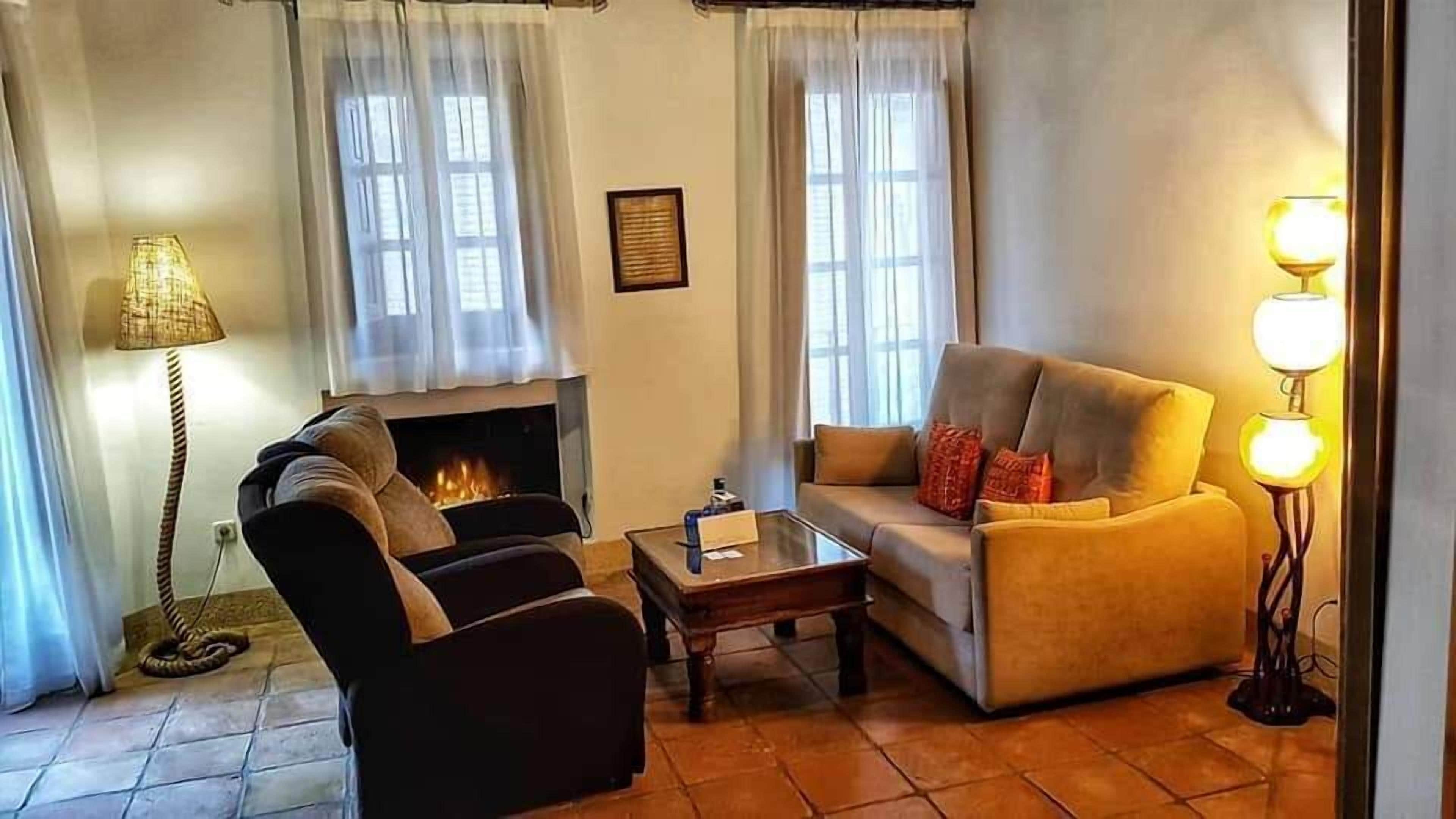 junior suite, balcony | living area | 60-inch flat-screen tv with cable channels, tv