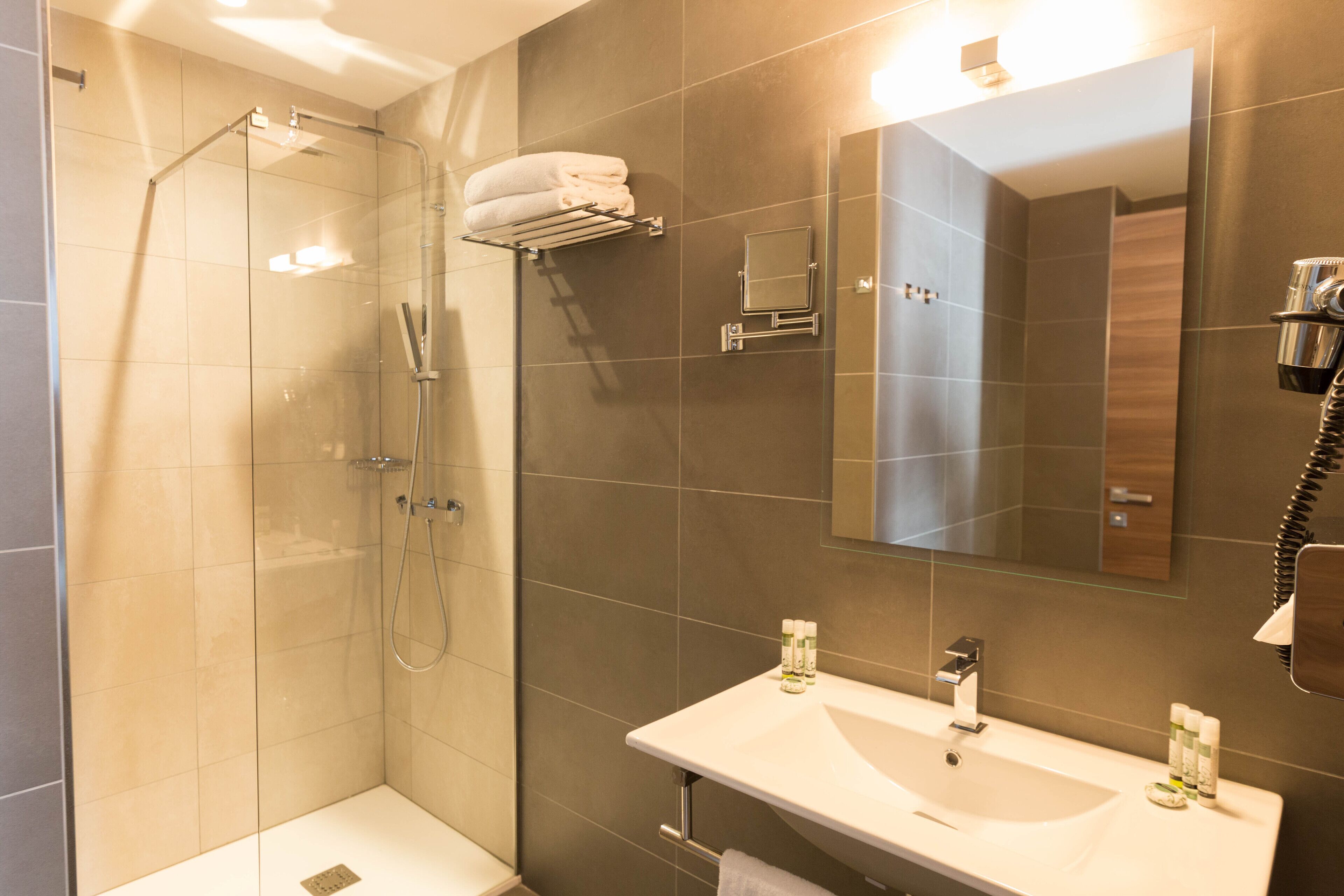 executive double room | bathroom | shower, rainfall showerhead, designer toiletries, hair dryer