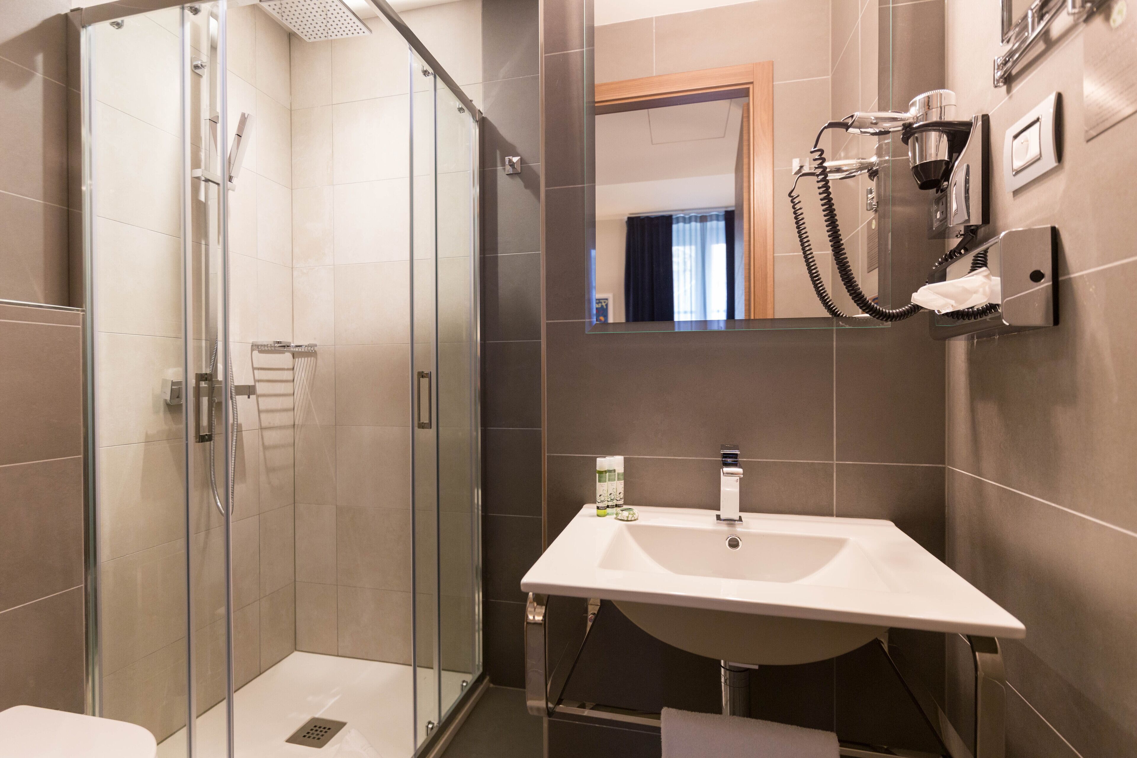 single room | bathroom | shower, rainfall showerhead, designer toiletries, hair dryer